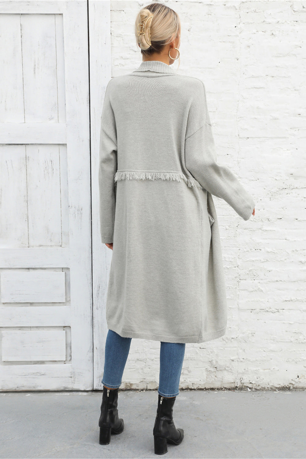 Light Gray longline knit cardigan with fringe trim detail.