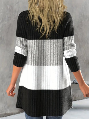 Monochrome block ribbed cardigan with horizontal stripes in black, grey, and white.