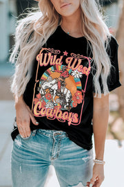 Black Wild West graphic t-shirt with cowboy, horse, flowers and retro sunset design.