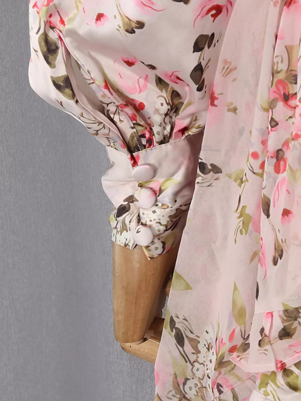 Charming Ruffled Floral Mini Dress with buttoned cuff and ruffle detail