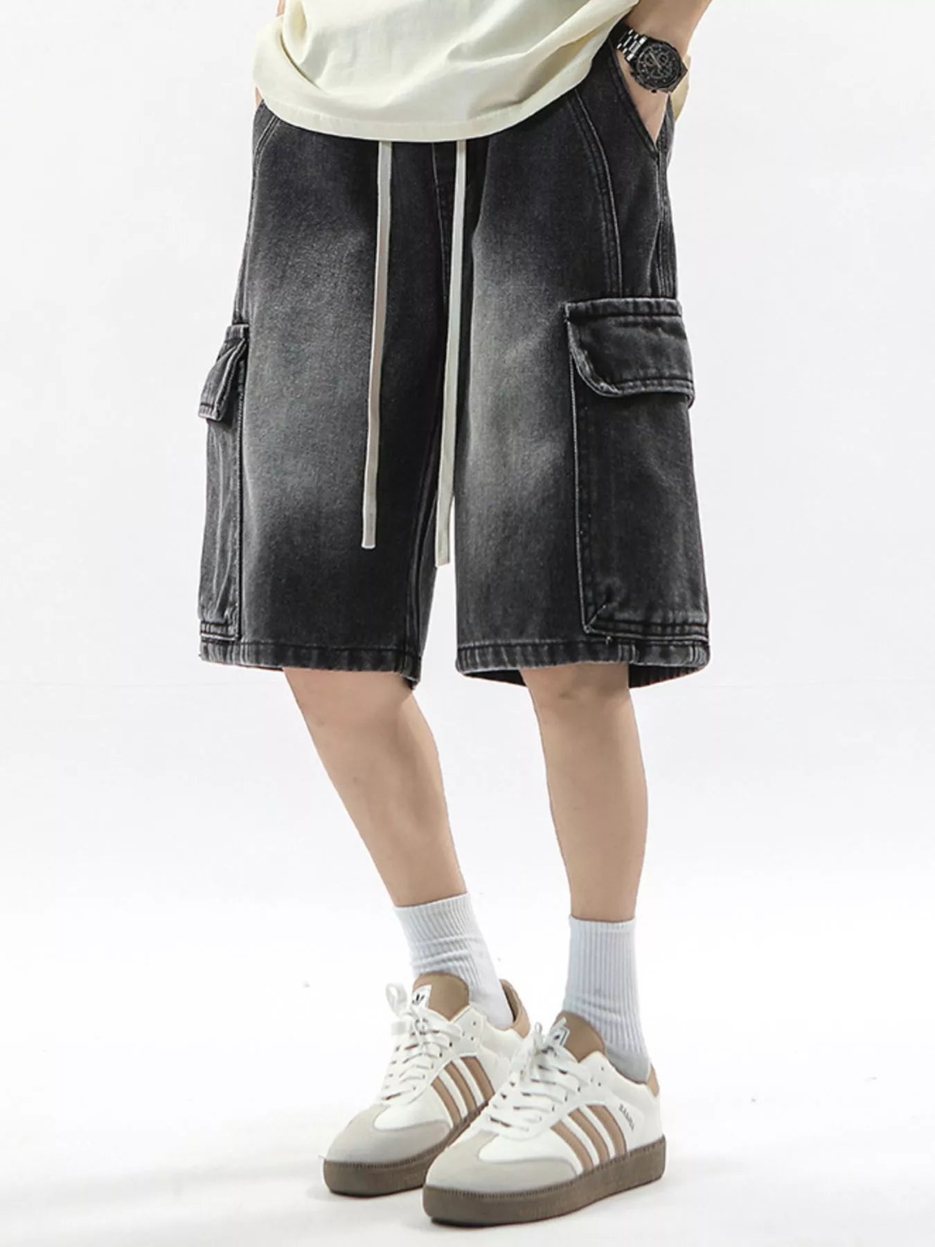 Men's Soot cargo shorts with drawstring waist and large side pockets.
