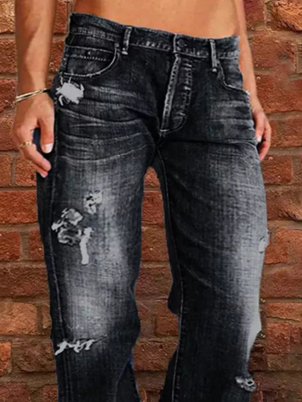 Black relaxed fit distressed denim maternity jeans with raw hem and button fly
