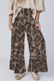 Camo print wide-leg maternity pants with ruffled hem and drawstring waist.