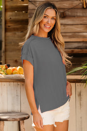 Textured ribbed tee in dark gray with rolled sleeves and a relaxed fit.