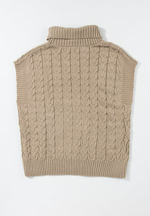 Khaki cable knit turtleneck capelet sweater with ribbed trim and short sleeves.