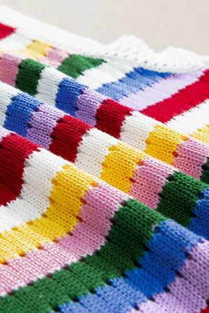 Crochet tank top with rainbow stripes in acrylic yarn, featuring a casual, beachwear style.