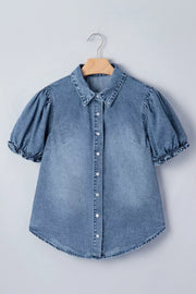 Chic frilled denim shirt with snap closure, puff sleeves, and a collared neckline.