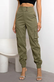 Sage utility cargo joggers with elastic cuffs and button closure.
