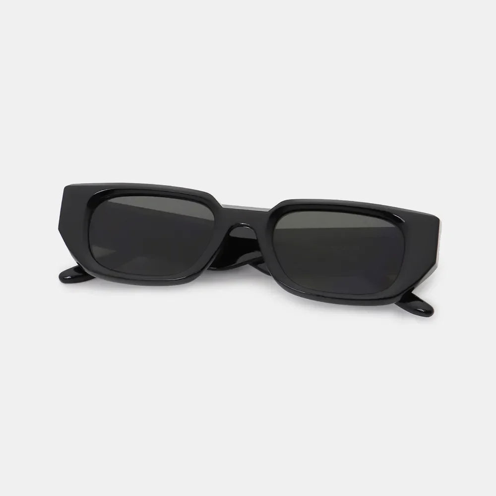 Black angular sunglasses with smoked acetate frames and dark lenses.