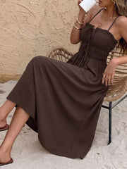 Charming tie-front midi dress in coffee brown with smocked waist and ruffled neckline.