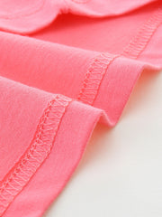 Pink cotton toddler t-shirt showing hem detail with double stitching.