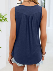 Navy blue ruched tank top with button detail and curved hem.