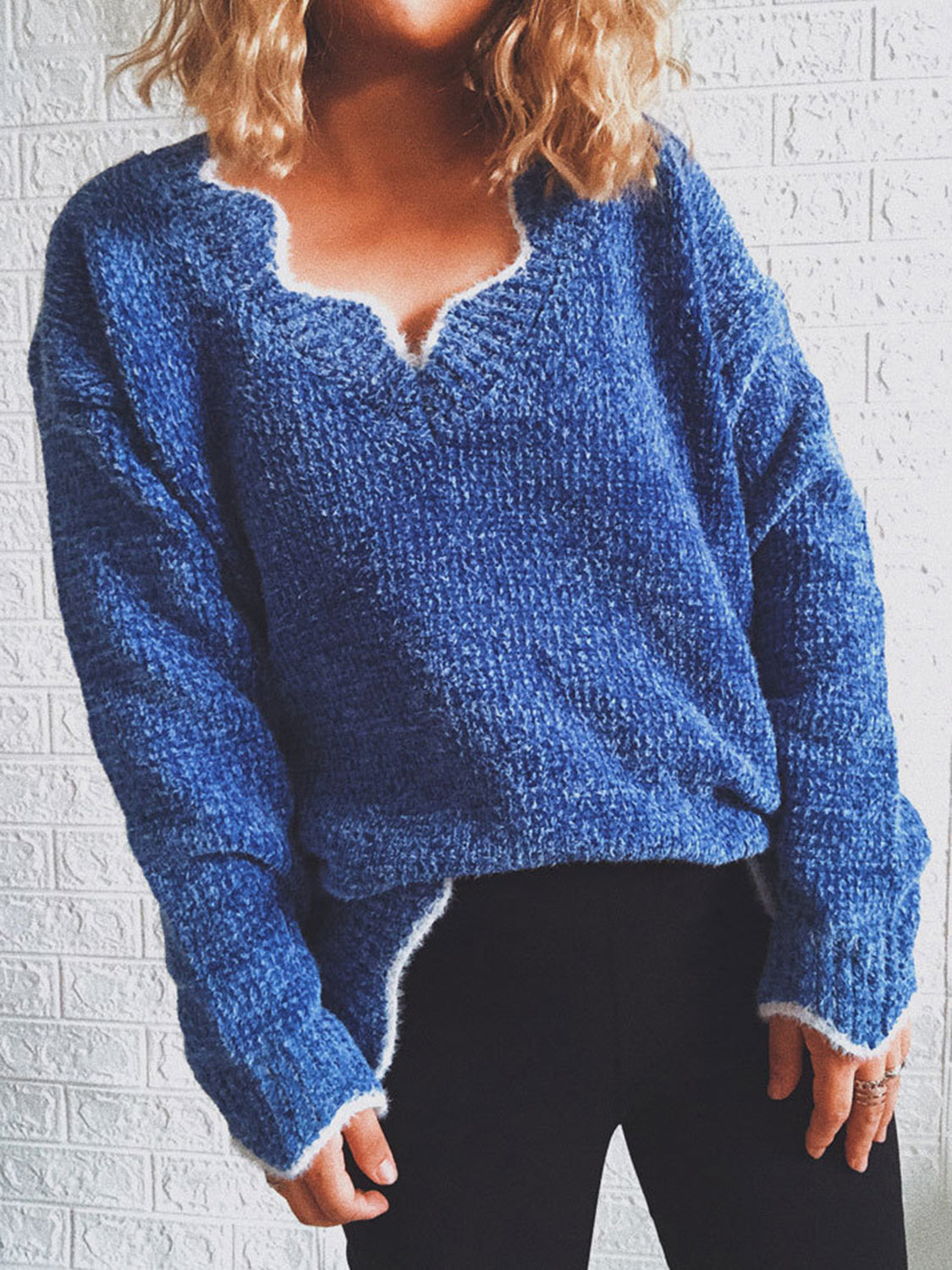Royal Blue acrylic knit sweater with scalloped V-neck trim and long sleeves.