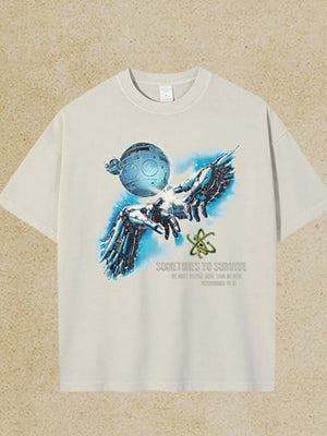 Ivory graphic tee with AI-inspired robot hands reaching for a sphere and atom symbol.