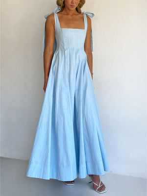 Light blue maxi dress with square neckline and bow tie shoulder straps