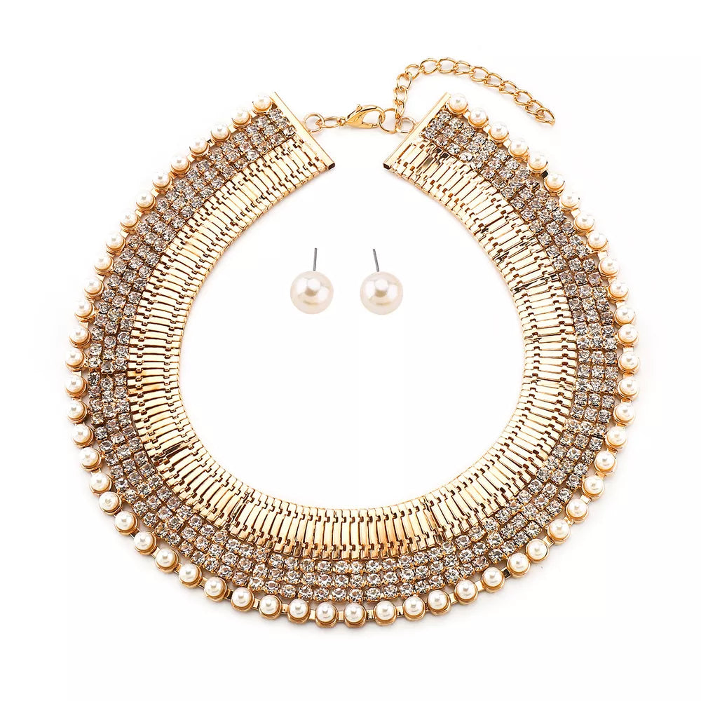 Gold-plated choker necklace and pearl stud earrings with crystal accents