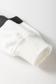 White loungewear set sleeve with black stripes and ribbed cuff detail
