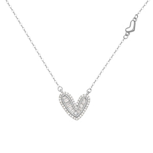Silver heart pendant necklace with baguette and round stones on a delicate chain.
