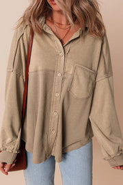 Tan waffle knit overshirt with button front and patch pocket.