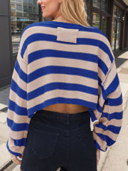 Off-shoulder cropped knit sweater with blue and camel stripes, featuring a ribbed detail on the back.