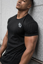 Black ribbed tee with white logo detail