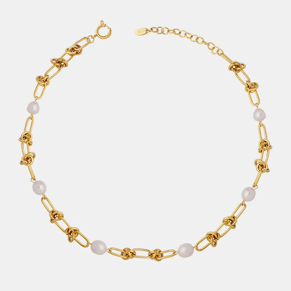 Gold linked pearl knot collar necklace with toggle clasp