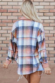 Colorblock plaid shacket with ribbed collar and cuffs, featuring pink, blue, and orange tones.