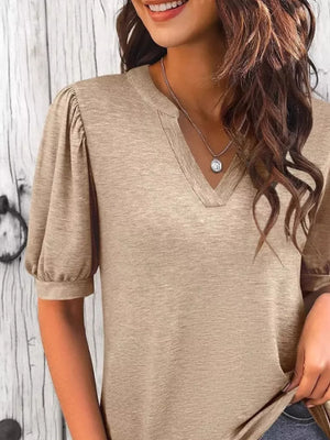 Camel t-shirt with puff sleeves and notched V-neck.
