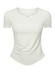 White ribbed notch-neck active top with ruched side detail
