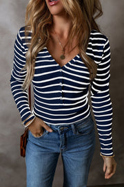 Ribbed stripe henley top in dark navy and white with a V-neck and button detail.