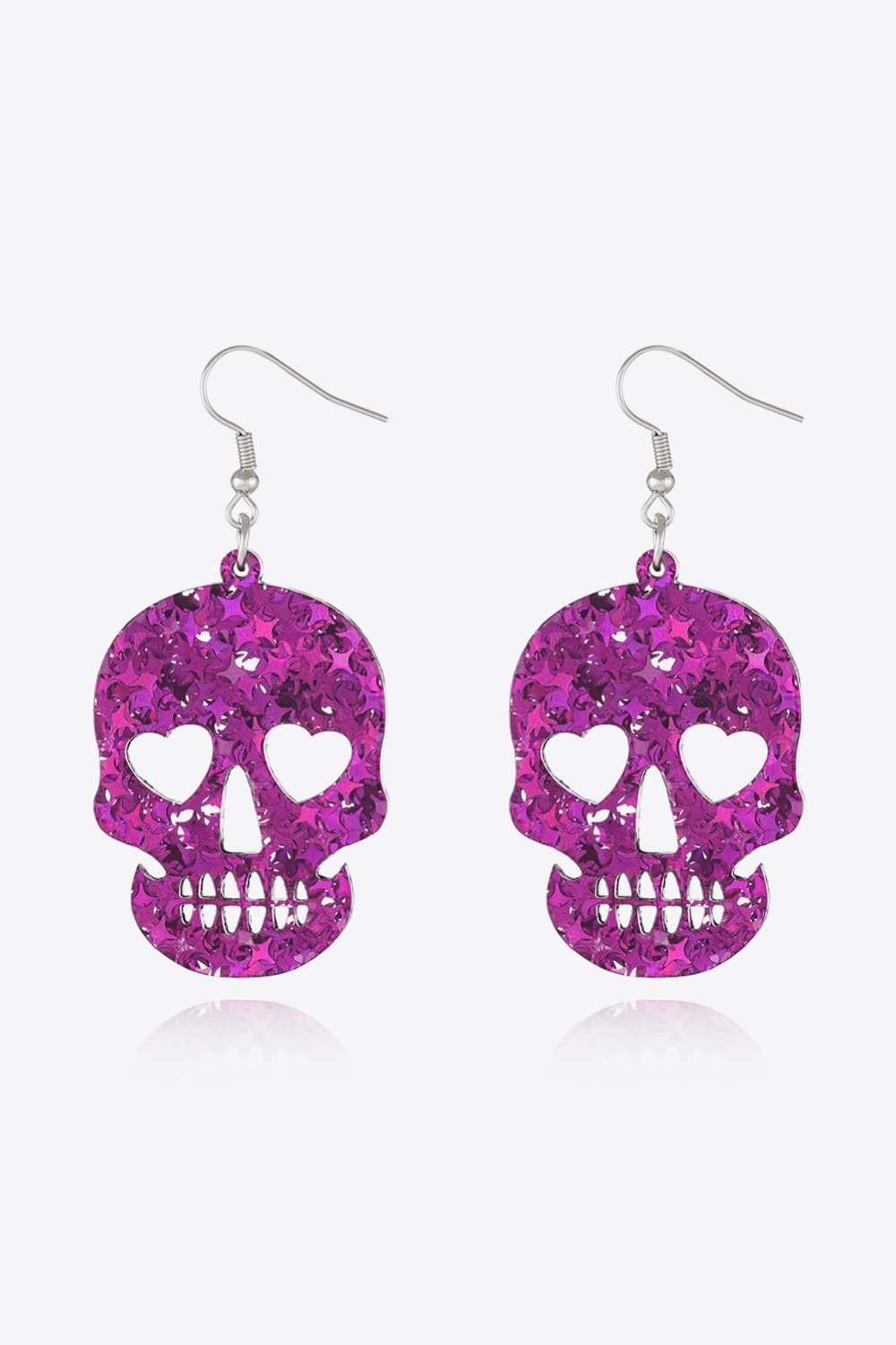 Glitter skull starburst dangle earrings with heart eyes in multicolor acrylic