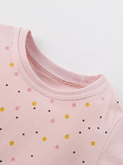 Toddler dress in blush pink cotton blend with scattered glitter polka dots and a crew neck.
