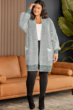Textured knit cocoon cardigan in Cloudy Blue with pockets and balloon sleeves.