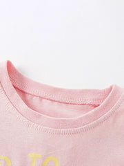 Toddler pink cotton t-shirt with crew neck and yellow graphic detail.