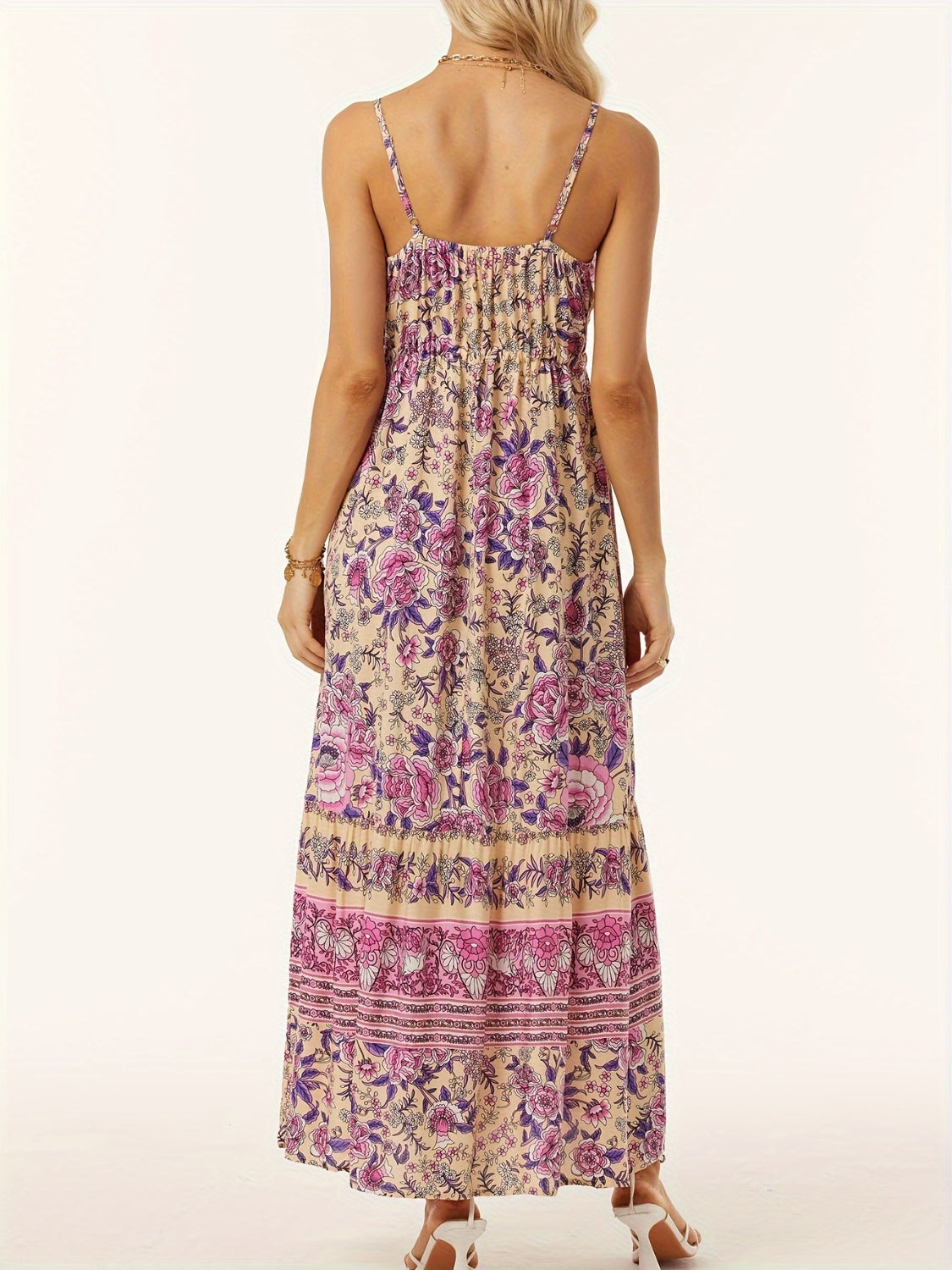 Bohemian floral maxi dress with adjustable waist and cami straps in pink and purple floral print.