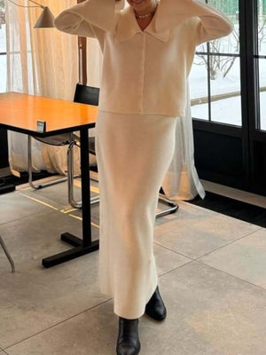 Milky white ribbed knit cardigan and maxi skirt set with button-down closure and collared neckline.