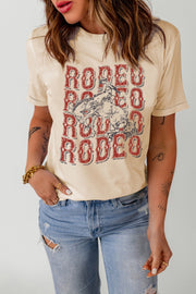 Light Apricot crewneck tee with a distressed rodeo graphic print.