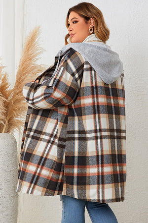 Plaid hooded shacket with balloon sleeves in black and brown plaid.
