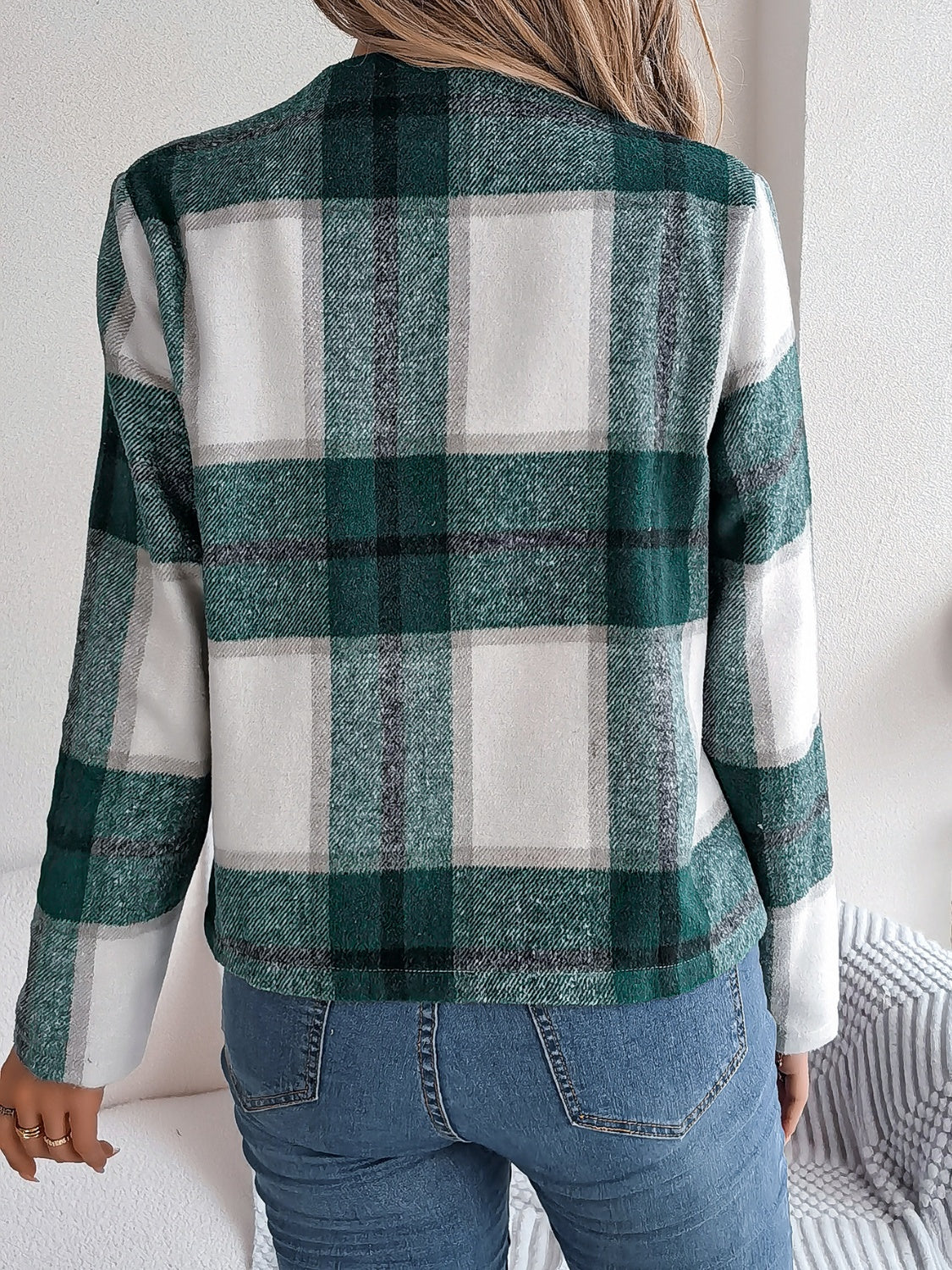 Collarless plaid cropped jacket in dark green with white and grey accents.