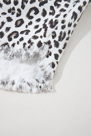 Leopard print denim shorts with frayed hem detail