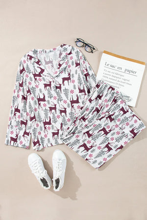 White festive reindeer print pajama set with long sleeves and v-neck top and pants