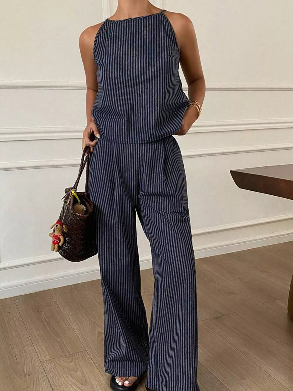 Blue striped sleeveless top and wide-leg pants set with a halter neckline.