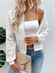 White textured mesh bomber jacket with a zip front and elastic cuffs.