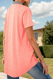 Burnt Coral contrast henley tee with patch pocket and grey collar.