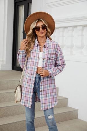 Oversized pastel plaid shacket with button front and chest pockets, styled with jeans.
