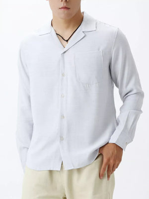 Men's light blue relaxed camp collar button-up shirt with chest pocket