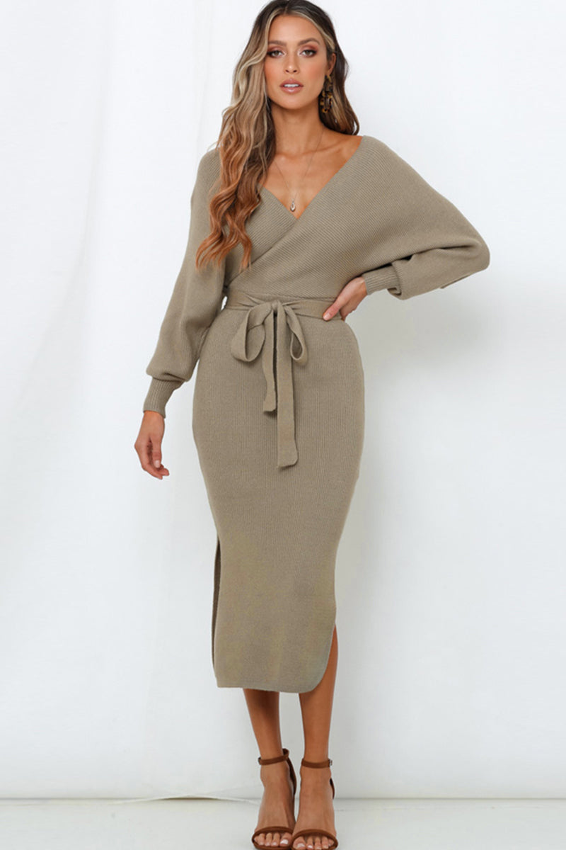 Khaki wrap-front midi knit dress with long sleeves, a belted waist, and a side slit.