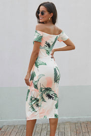 Off-shoulder midi dress with tropical leaf print in white, green, and blush pink.