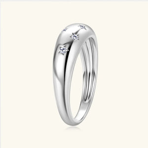Silver dome ring with starburst accents and cubic zirconia stones