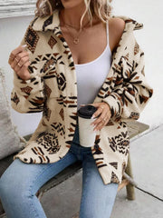 Tan Aztec print sherpa shacket with button front and collar.